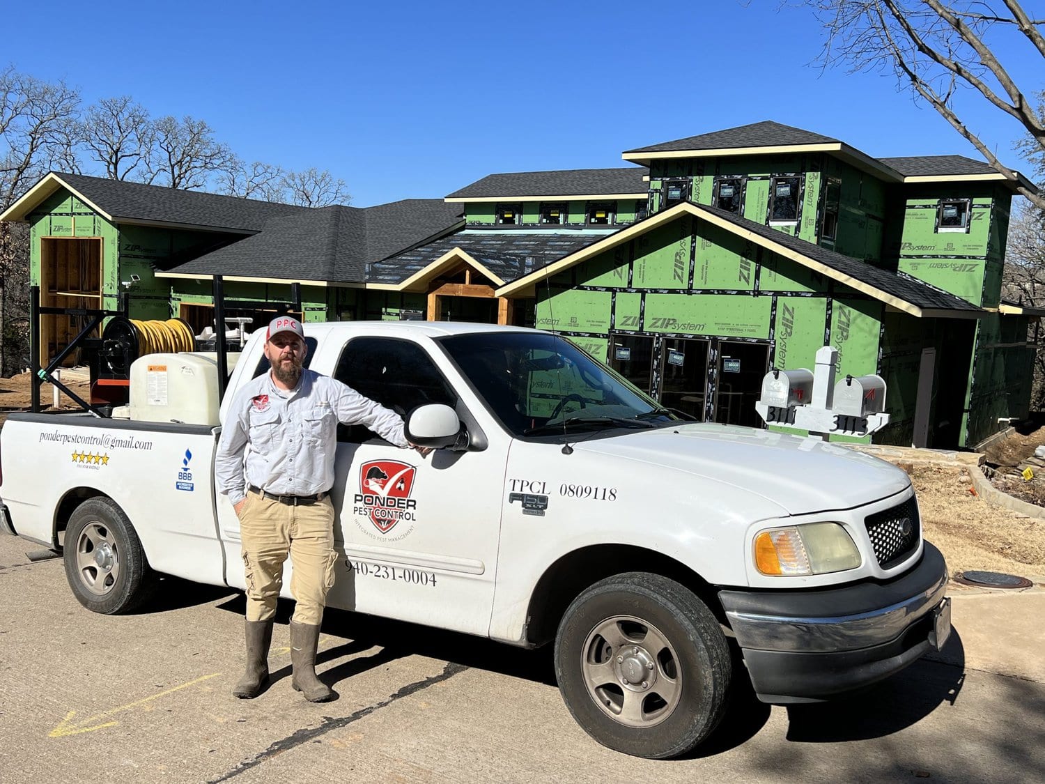 Cory Hafsaas standing in front of a ponder pest truck