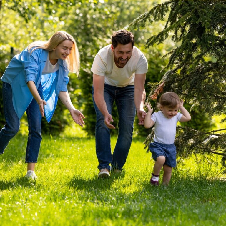 Parents and child playing safely outdoors after eco-friendly pest control treatment in Northlake TX